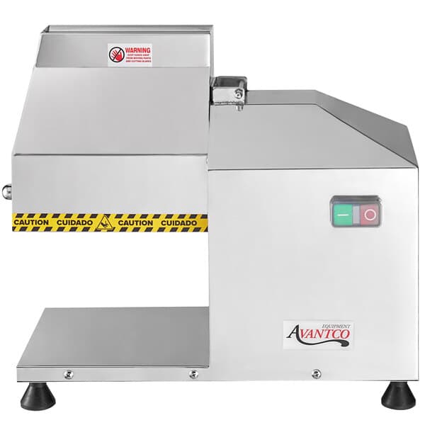 An Avantco stainless steel meat tenderizer with a yellow warning label.