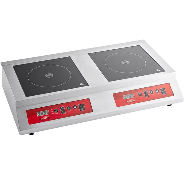 An Avantco double countertop induction range with two black plates and red dials.