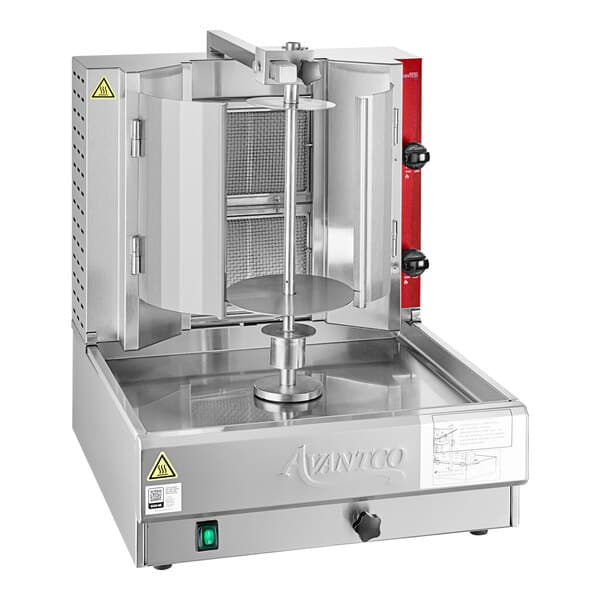 An Avantco gas vertical broiler with a round object inside and a red handle on the door.