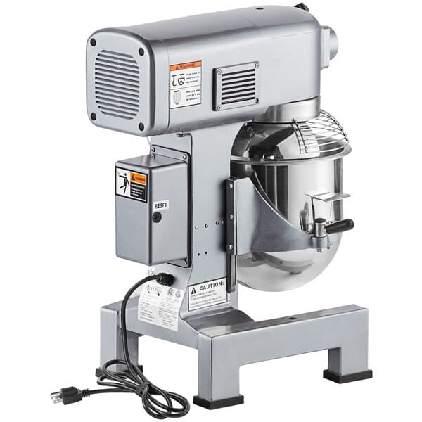 An Avantco commercial stand mixer with a metal stand and standard accessories.