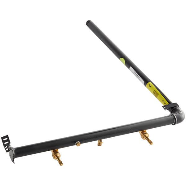 A black pipe with gold metal bars and a yellow label.