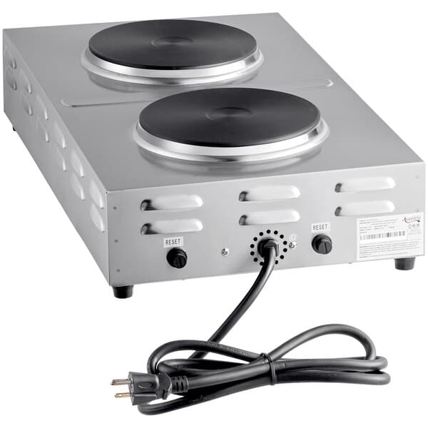 An Avantco stainless steel double burner hot plate on a counter with two burners.