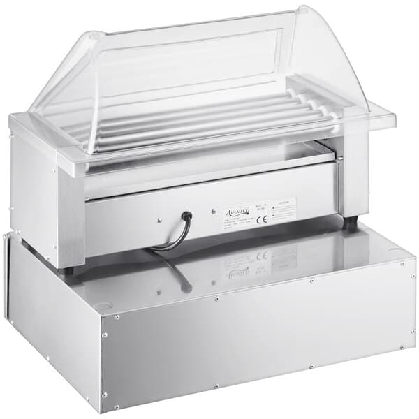 An Avantco stainless steel hot dog roller with a clear lid.