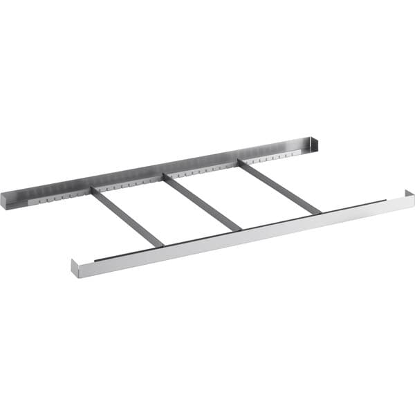 A metal divider kit with four sections.