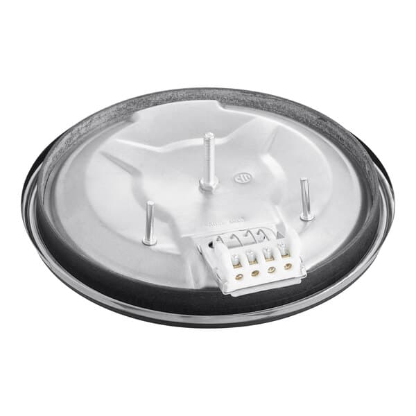 A round metal plate with a black ring and a white base.