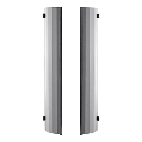 A pair of metal heat shields with a black border and white rectangular design.