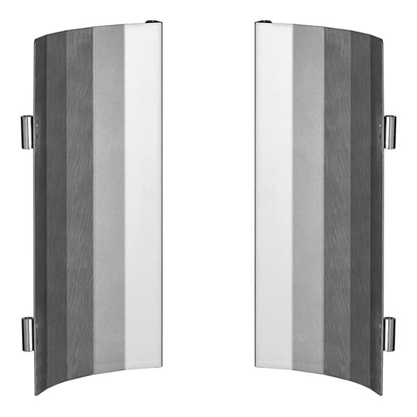 A pair of metal heat shields with black and silver stripes.