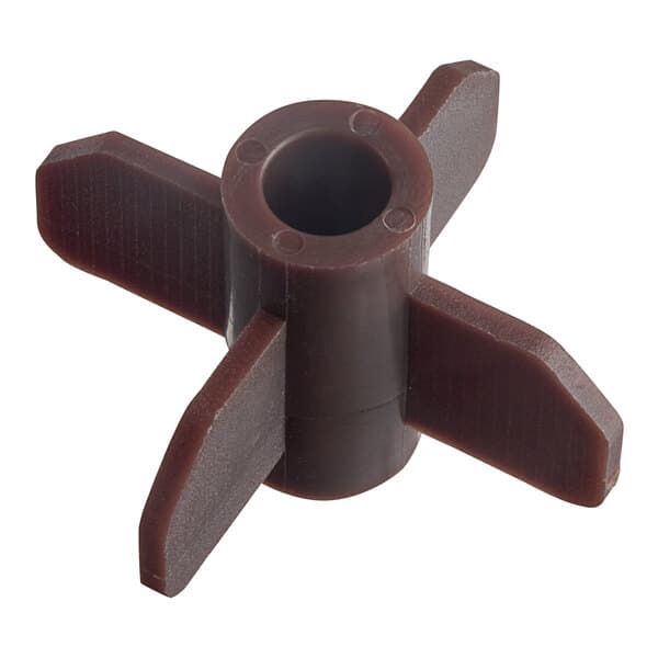 A brown plastic stirrer attachment for a cappuccino or hot chocolate machine.