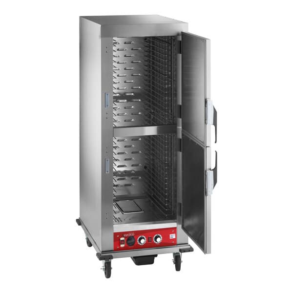 A full size insulated heated holding and proofing cabinet with solid stainless steel Dutch doors and multiple tray slots.
