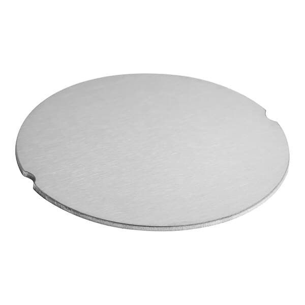 A circular silver metal screw cover.