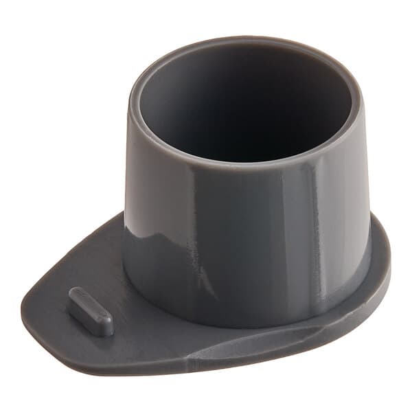 A grey rectangular clogging sleeve with a hole on one end.